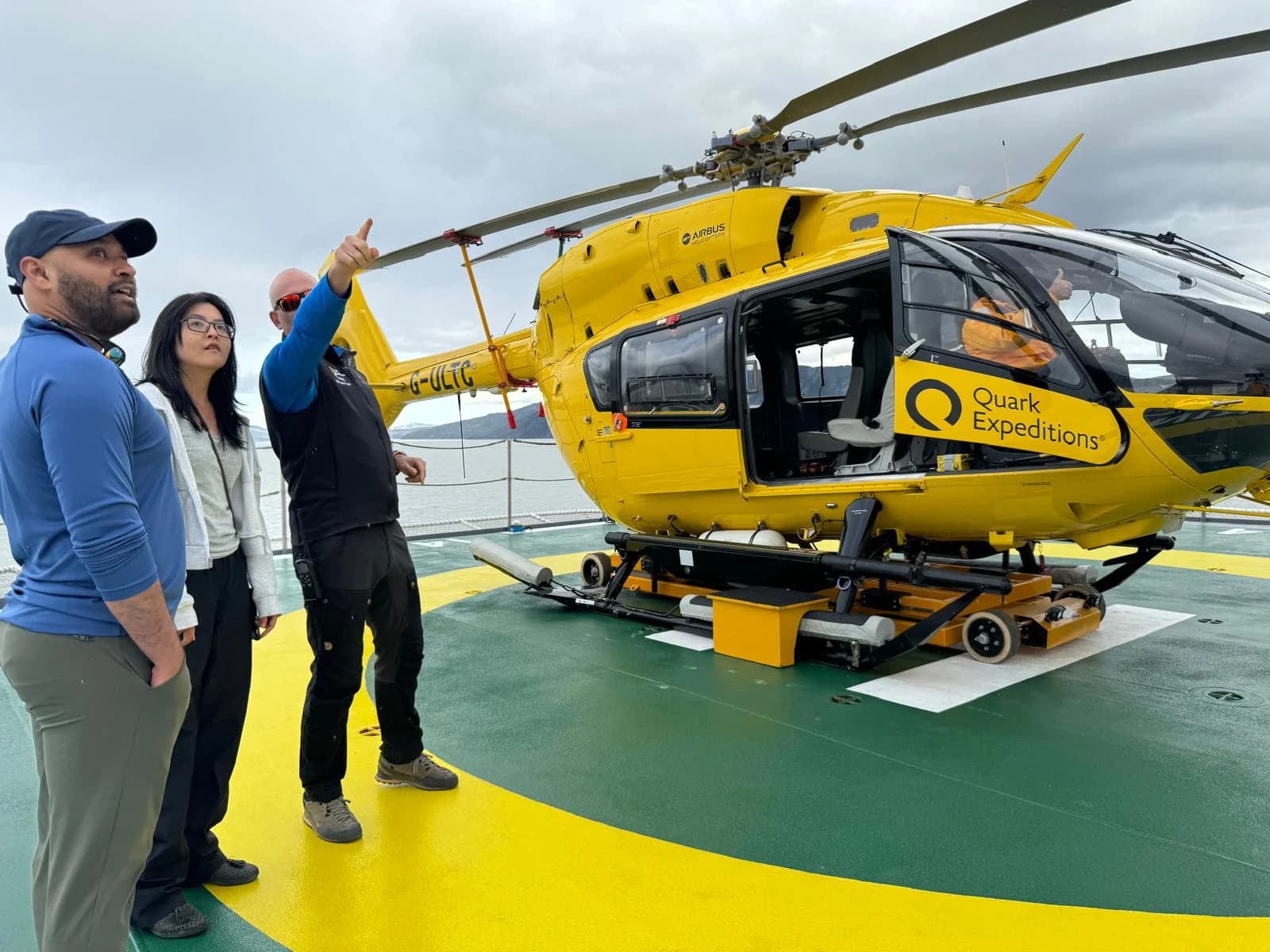Beside the helicopter